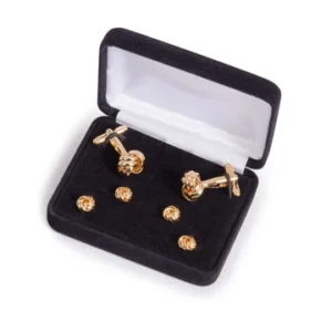 Gold cufflinks and studs in elegant box.