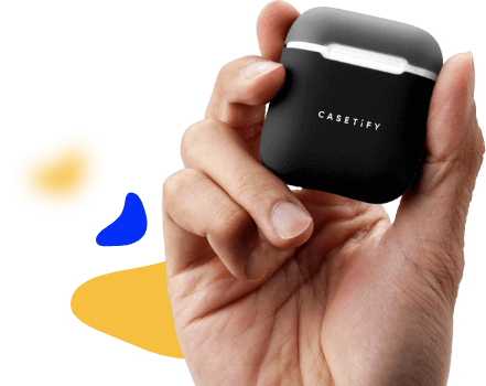Hand holding black CASETIFY AirPods case